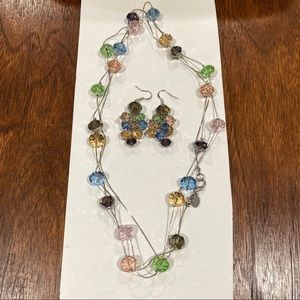 matching dangling earrings and long beaded necklace pastel clear rainbow beads